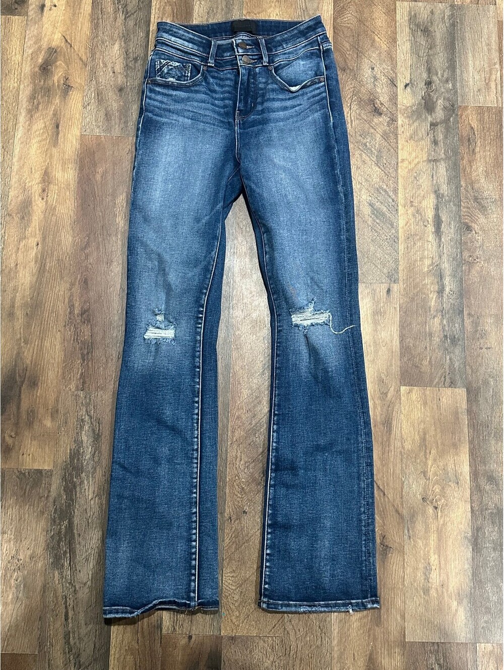 Buckle black bootcut jeans